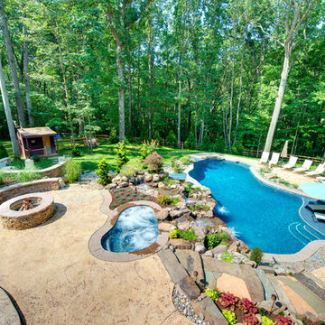 Swimming Pool with custom waterfalls & hot tub.