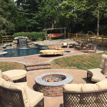 Freeform Pool with Grotto, fire pit, tanning ledge & floating table