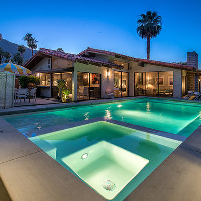 Example of a small 1950s backyard concrete and rectangular pool fountain design in Los Angeles