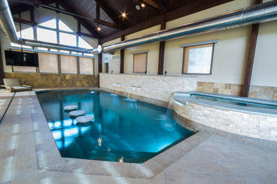 Inspiration for a mid-sized modern indoor tile and rectangular lap pool house remodel in Other