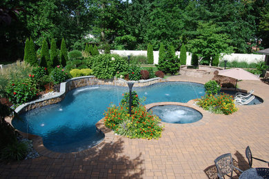 Inspiration for a rustic pool remodel in Philadelphia