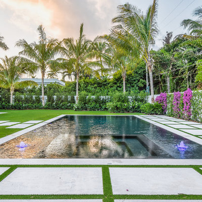 Mid-sized trendy backyard rectangular lap hot tub photo in Miami