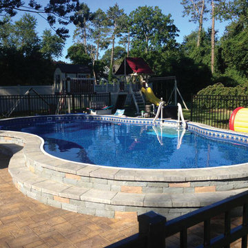 Radiant Free Form Semi In Ground Pool with Pavers