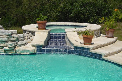 Ranch Home Freeform Pool with Limestone Deck and Fire Pit