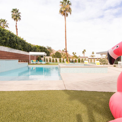 Inspiration for a large 1960s backyard rectangular pool remodel in Los Angeles