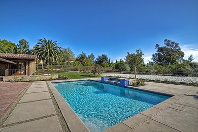 Mountain style pool photo in San Diego