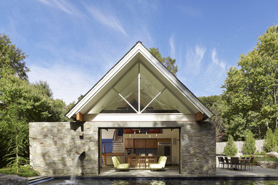 Inspiration for a small contemporary backyard concrete and rectangular lap pool house remodel in DC Metro