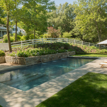 rectangular pool + fountain wall