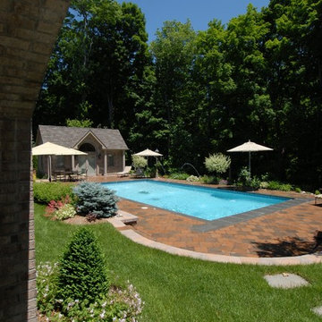 Rectangular Pool with Deck Jets and Pool House
