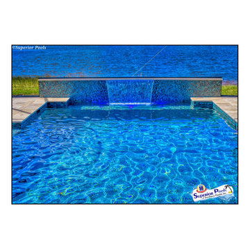 (Rennehan) FT MYERS FL Superior Pools Swimming Pool With Raised Wall & Waterfall