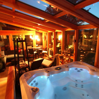 Inspiration for a large contemporary backyard rectangular aboveground hot tub remodel in Other