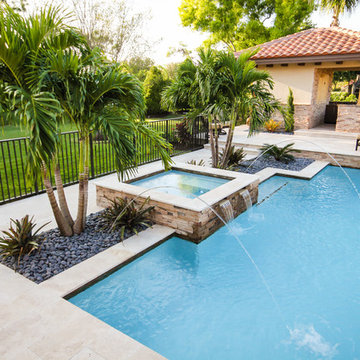 Roman/Geometric Pool with Spa & Water Features Including Sun Shelf in Boynton Be
