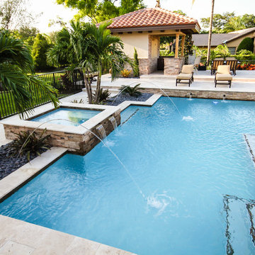 Roman/Geometric Pool with Spa & Water Features Including Sun Shelf in Boynton Be