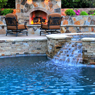 Inspiration for a mediterranean round pool remodel in Orange County