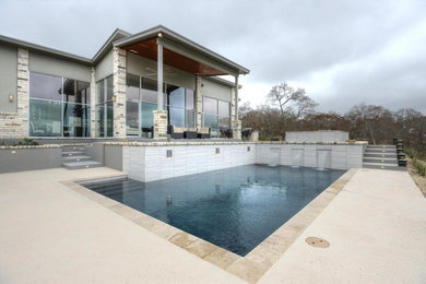 Pool - large modern rectangular pool idea in Austin