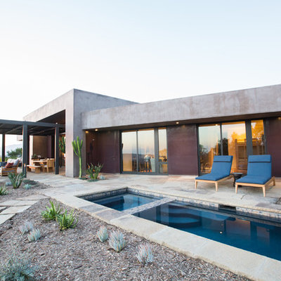 Inspiration for a mid-sized southwestern backyard rectangular lap hot tub remodel in Santa Barbara