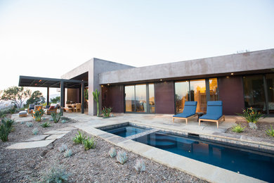 Inspiration for a mid-sized southwestern backyard rectangular lap hot tub remodel in Santa Barbara