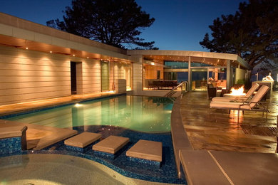 Inspiration for a tile and custom-shaped pool remodel in San Diego