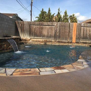 Shapero residence. custom pool, water features & Baja shelf.