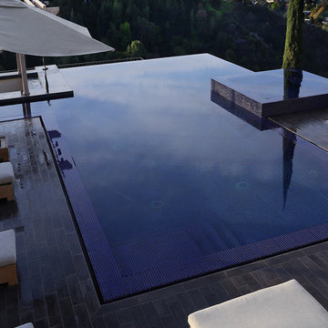 Sleek Wooden Deck Flows into Pool