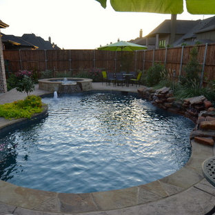 Photo of a small country backyard custom-shaped pool in Dallas.