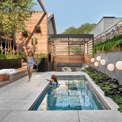 Inspiration for a contemporary backyard rectangular lap pool remodel in Chicago