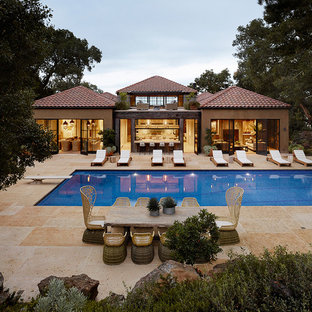 Example of a tuscan backyard rectangular pool design in San Francisco