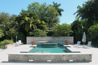 Example of an island style custom-shaped pool design in Miami