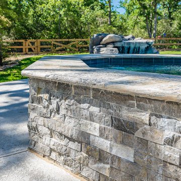 Spa Walls and Travertine Coping