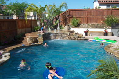 Example of an island style pool design in Austin