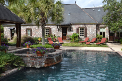 Hot tub - mid-sized traditional backyard brick and rectangular lap hot tub idea in New Orleans