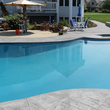 Stamped Ashlar Pattern Gray Concrete Pool Deck