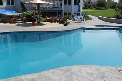 Inspiration for a craftsman backyard concrete paver pool remodel in Atlanta