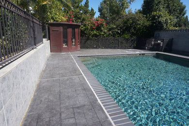 Example of an arts and crafts pool design in Los Angeles
