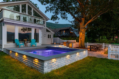 Inspiration for a small modern backyard rectangular pool remodel in New York