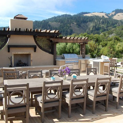 Inspiration for a large mediterranean backyard tile and rectangular hot tub remodel in San Francisco