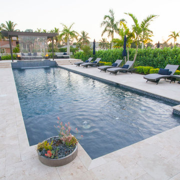 Straight Edge Pool in Parkland Florida with Custom Pergola and Tile