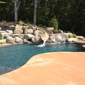 Stroud Township salt water pool with spa, sunshelf, slide, and waterfall