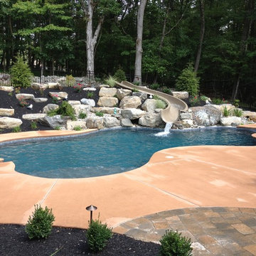 Stroud Township salt water pool with spa, sunshelf, slide, and waterfall
