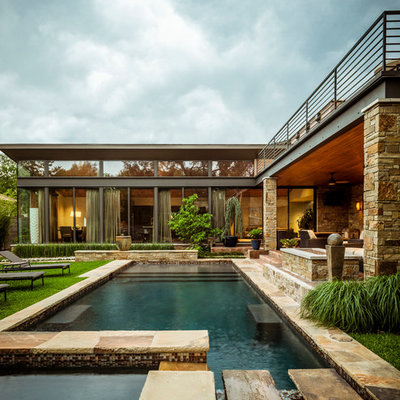 Inspiration for a contemporary rectangular pool remodel in Dallas