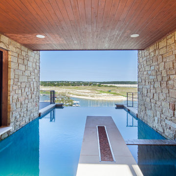 Swimming pool covered with fire pit- Lake Travis Waterfront Custom Home