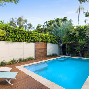 Inspiration for a beach style backyard rectangular pool in Gold Coast - Tweed with decking.