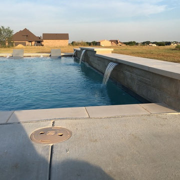 Swimming pool water feature walls