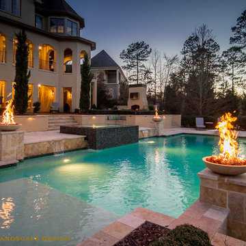 SWIMMING POOL WITH FIRE BOWLS