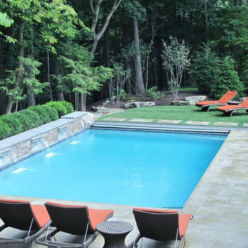 SWIMMING POOL WITH WATERFALL, BAR, POOL HOUSE, & FIRE PIT