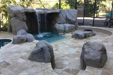 Tampa firepit seating area with grotto