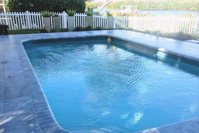 Tarpon Springs Ocean Blue Marble Pool Deck and Coping