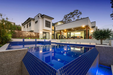 Design ideas for a contemporary swimming pool in Brisbane.