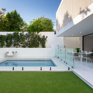 Design ideas for a small contemporary rectangular pool in Brisbane with tile.