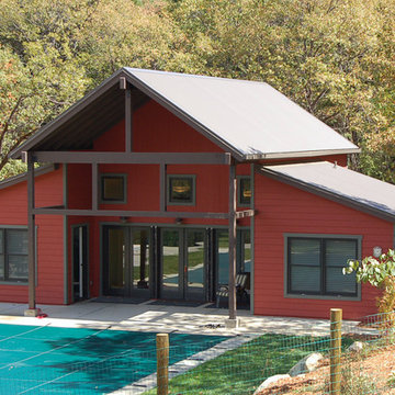 The pool house has two guest rooms and a recreation room.